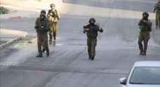 “Israeli” forces arrest university students in West Bank