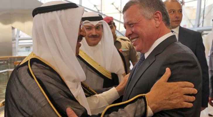 His Majesty King Abdullah is received by Kuwaiti Emir Sheikh Sabah Al Ahmad Al Sabah in Kuwait last year. (Jordan Royal Court) 