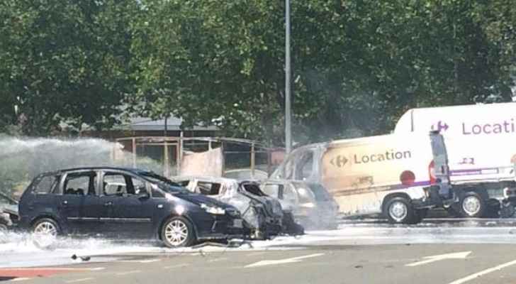 Car explodes after hitting police van on Paris's Champs-Elysees: official