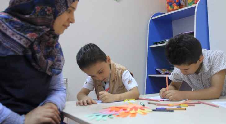 Children take art therapy sessions at the Sir Bobby Charlton Centre for Support and Rehabilitation, Amman. (Ro'ya) 