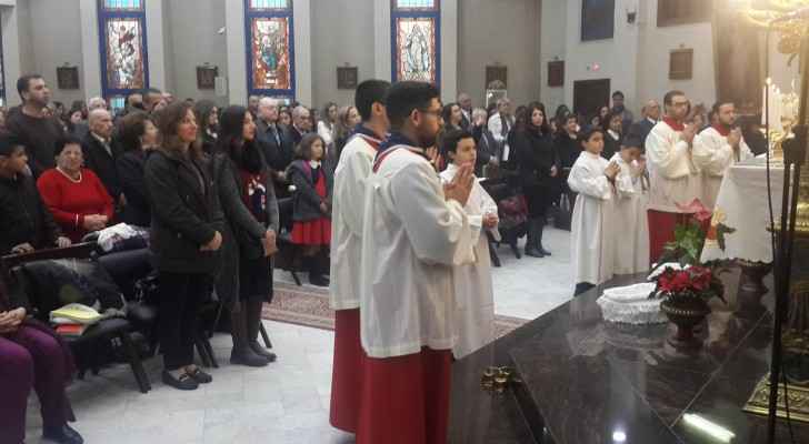 Jordanian Christians gathered to perform the Christmas Eve Mass. (ROYA ARABIC)