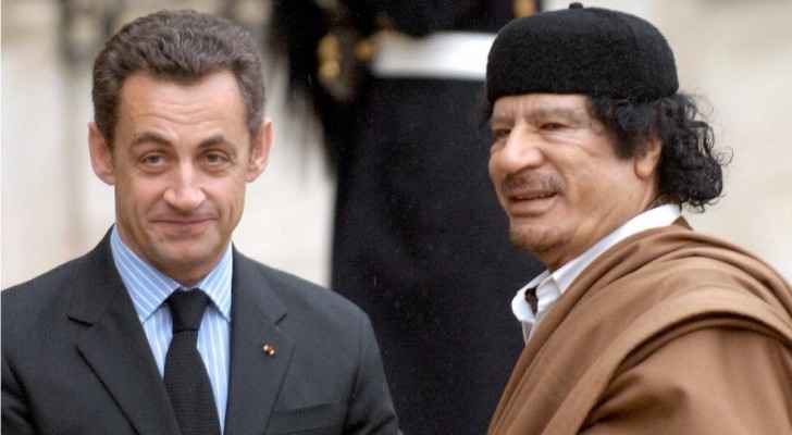  Former French President Nicolas Sarkozy with the late Libyan leader Muammar Gaddafi