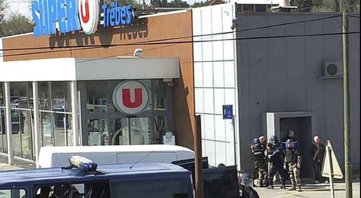 Police outside the supermarket in Trèbes. (AP)