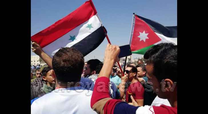 Jordanians and Syrians during the protest against US-led airstrikes in Syria.