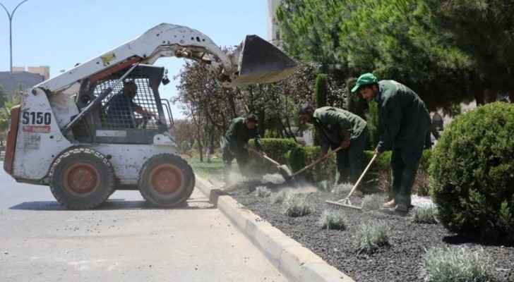 Municipality workers gardening (Municipality of Amman)