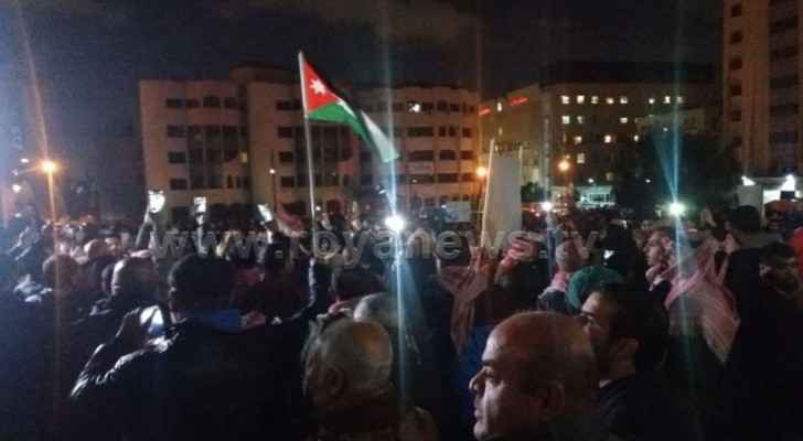 Dozens of Jordanians protested near the Fourth Circle on Thursday. (Roya)
