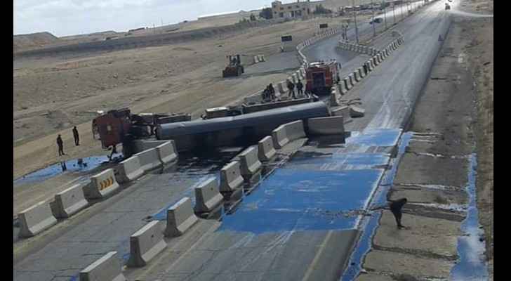 Oil tanker tips on its side on Desert Highway