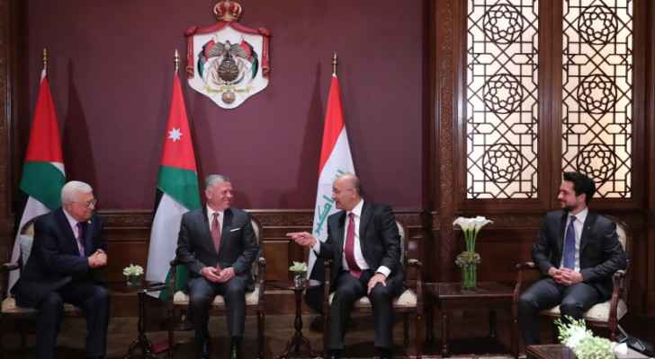 King holds trilateral meeting with Iraqi, Palestinian presidents