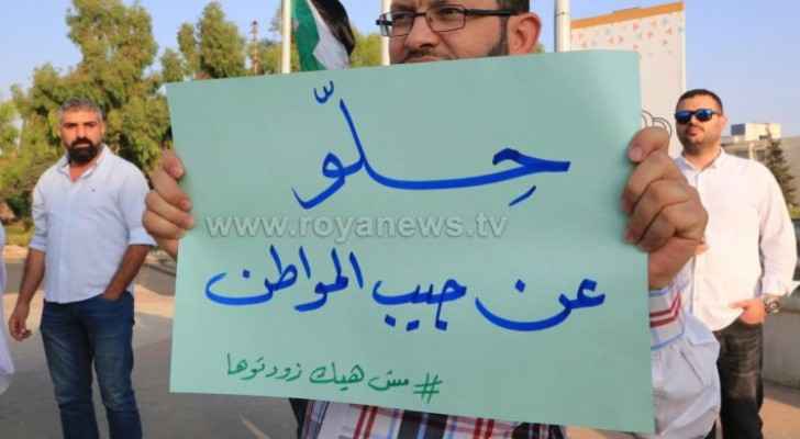 Citizens protest against fuel tax near 6th circle in Amman