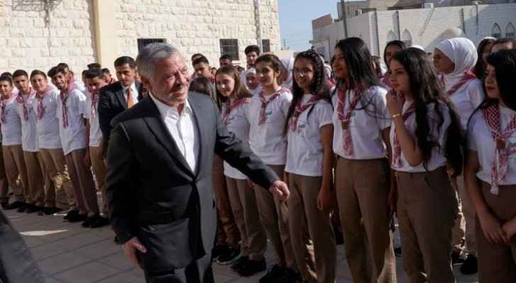 Video: King joins students in school morning queue in Al Hussein Secondary School for boys