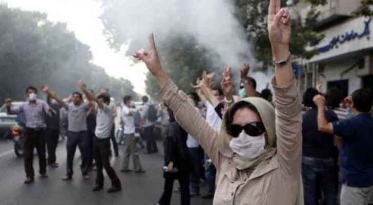 Regime supporters rally against Iran 'rioters' as Amnesty says at least 143 killed