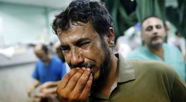 A Palestinian man crying
