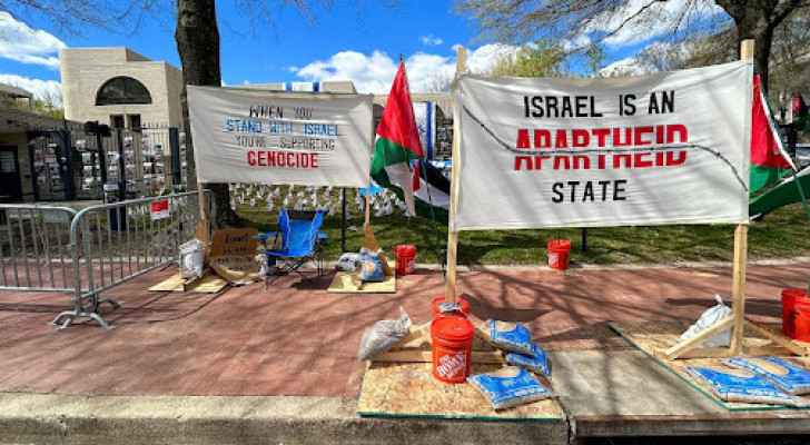 Signs in front of the Israeli Occupation embassy in Washington, DC 