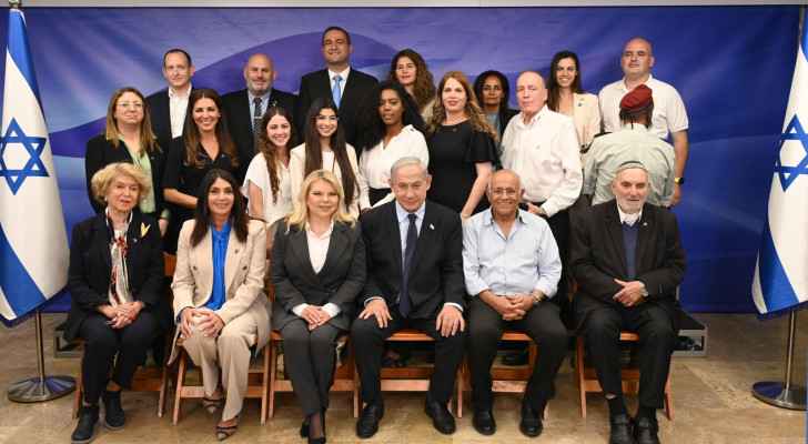 “Israeli” Prime Minister Benjamin Netanyahu pictured in an event with Moshik Aviv present in the third row second from the left. (photo: gov.il) 