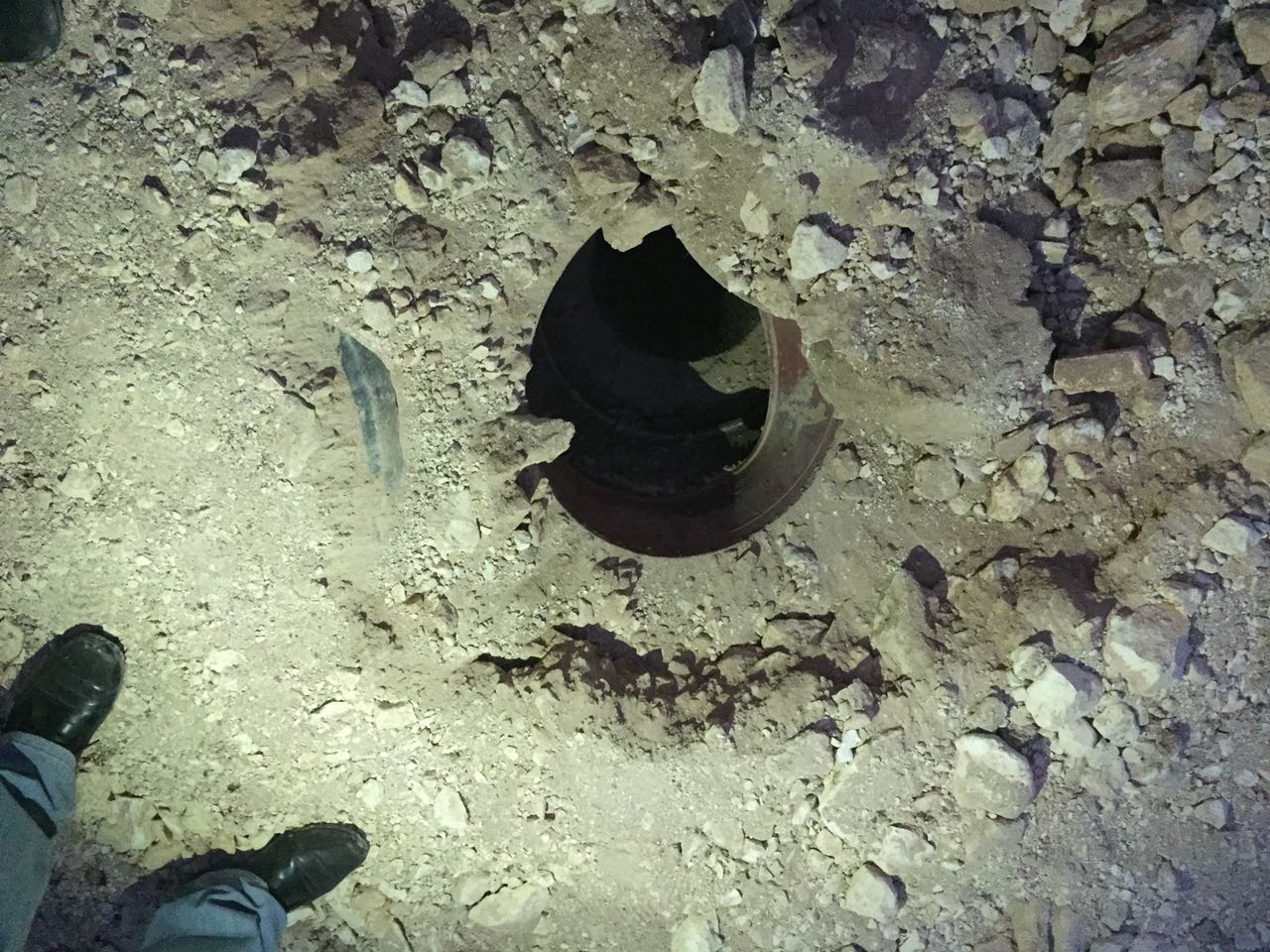 The raid uncovered a 250m-deep well which the ministry filled.