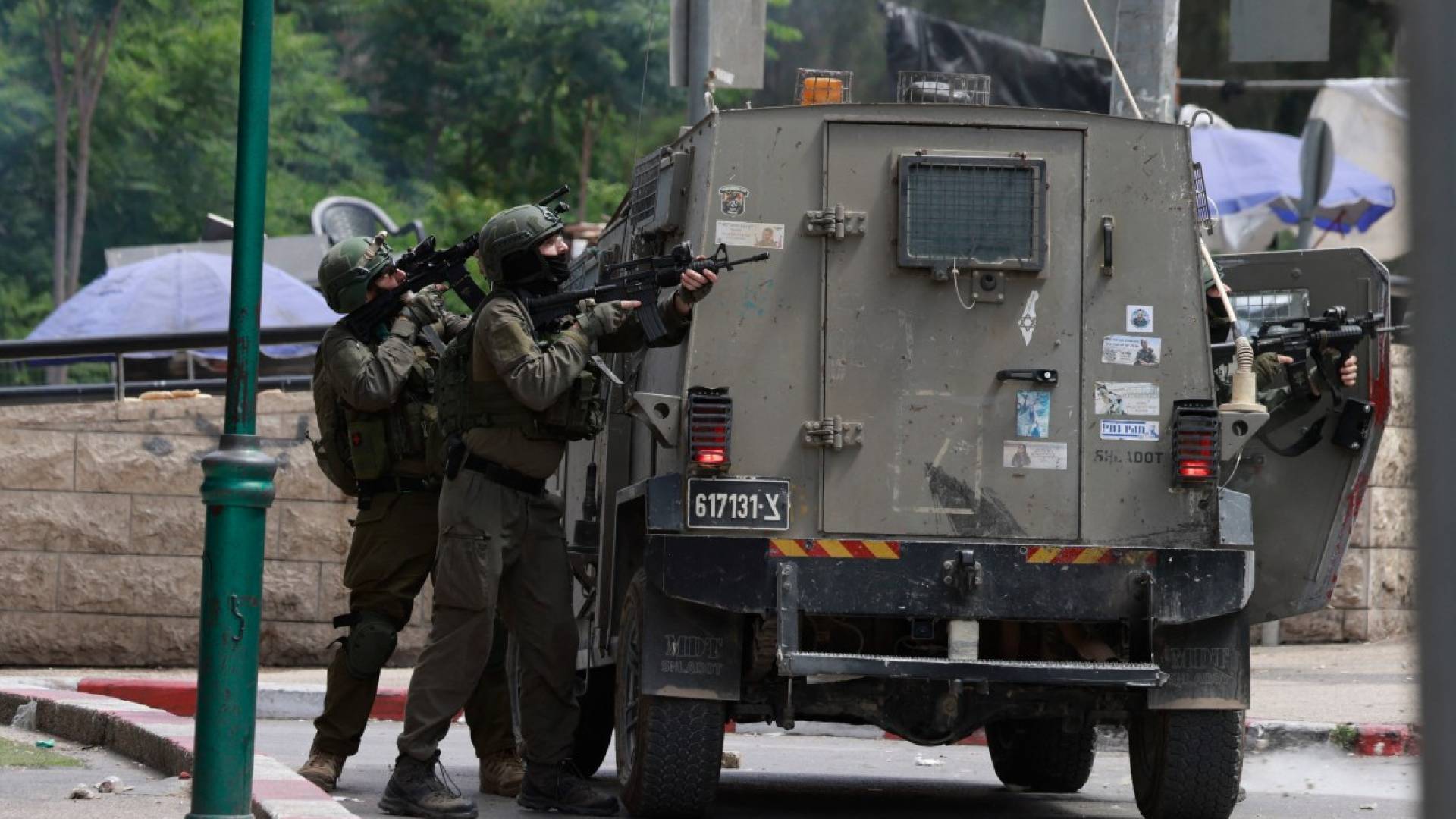 "Israeli" forces ram bus carrying elderly Hajj pilgrims in West Bank