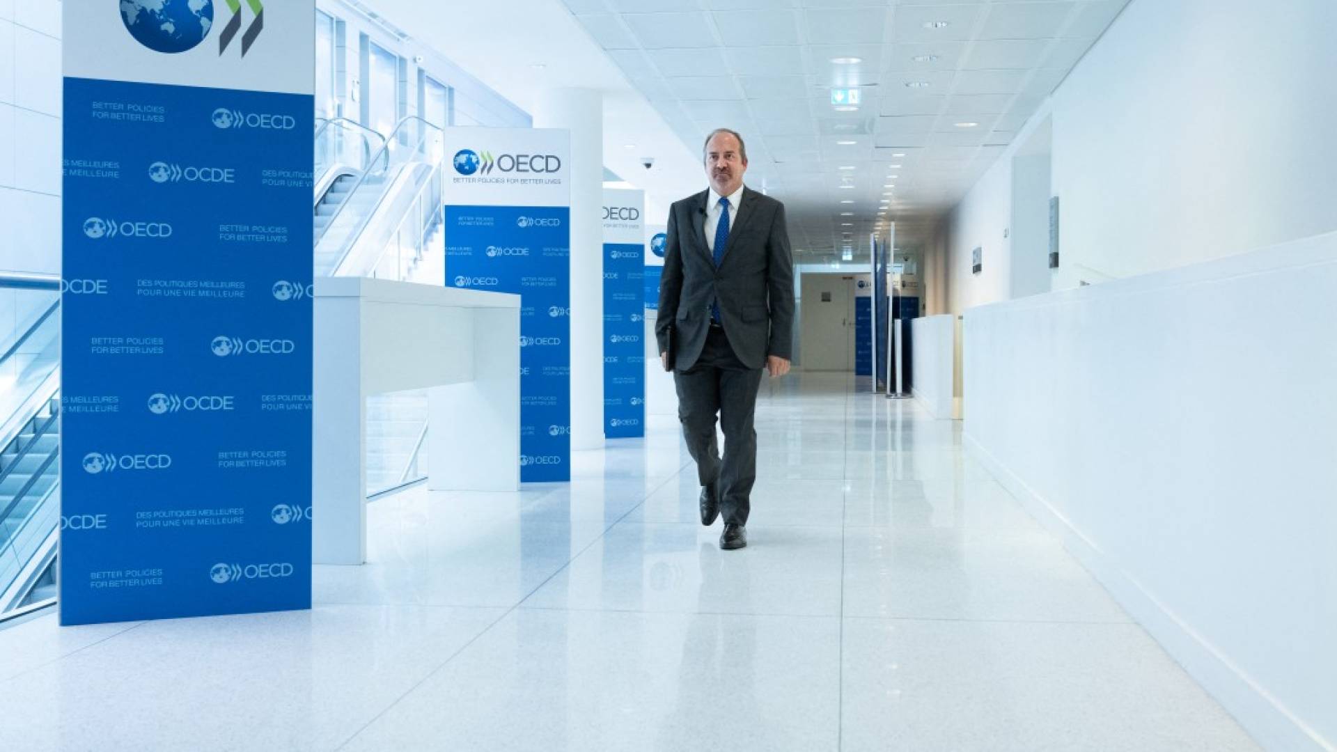 Global economy to grow faster than expected, OECD says