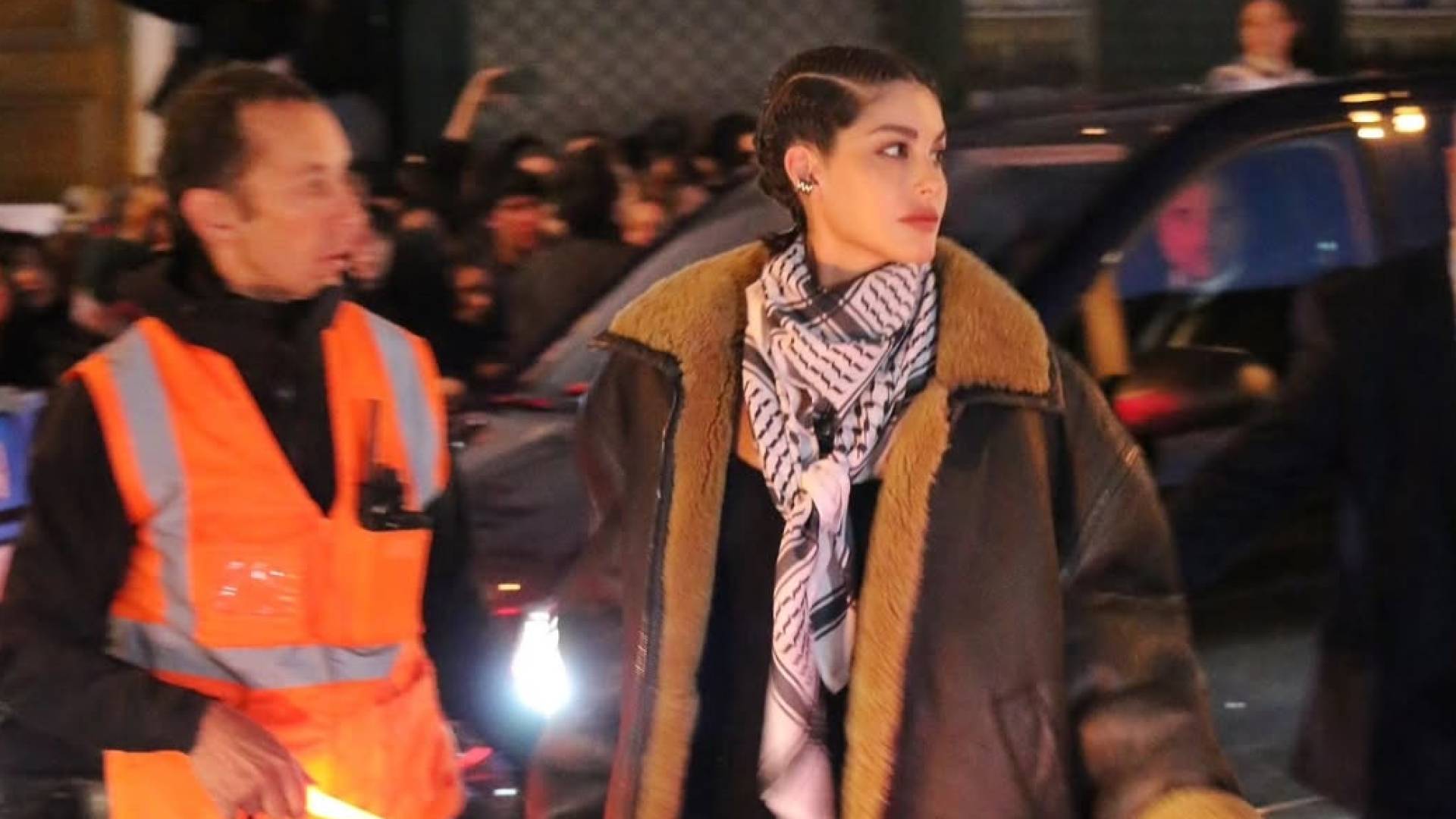 Lebanese model Nour Arida wears Palestinian keffiyeh at Paris Fashion Week