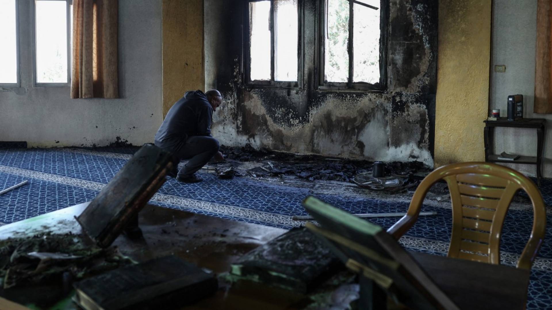 'Israeli' forces kill two Palestinian children, settlers torch West Bank mosque