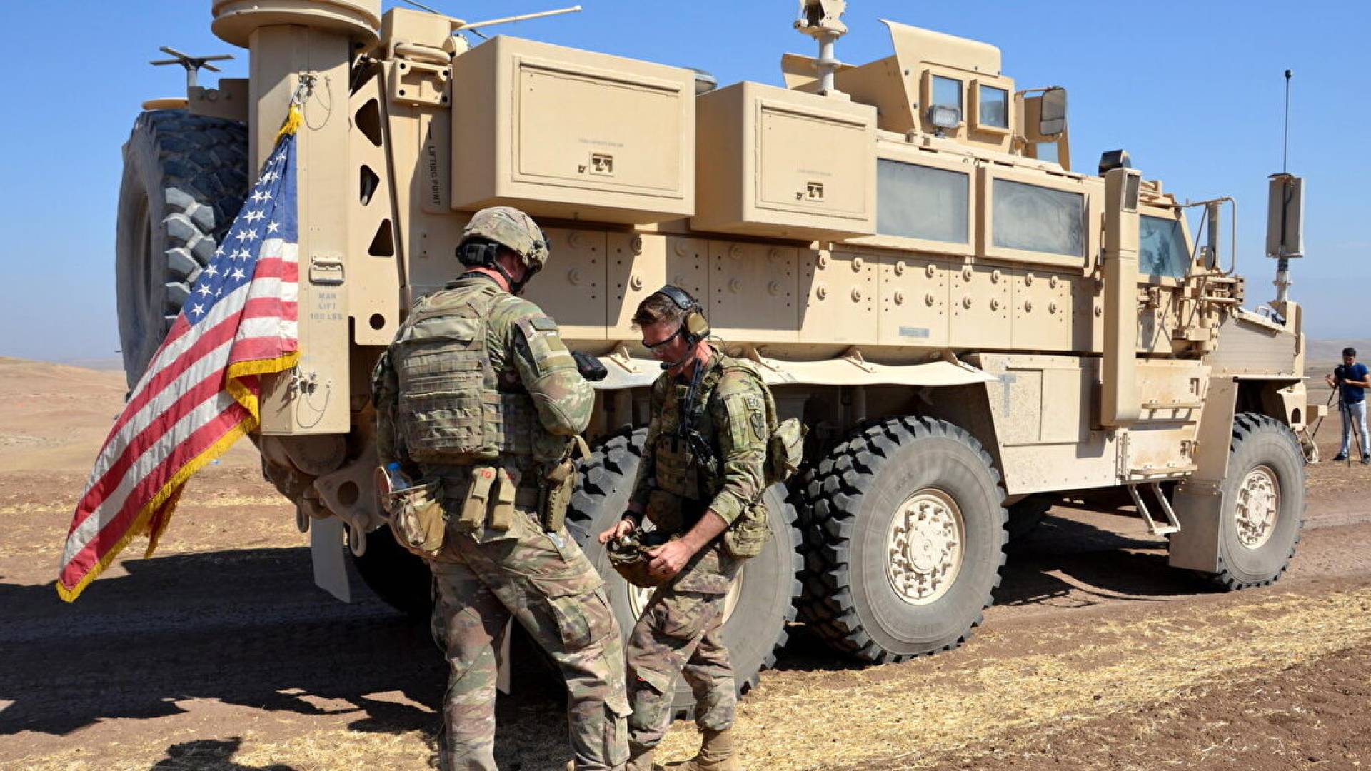 Syrian gunman who killed three Americans was set to be fired for "extremist views"