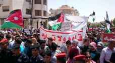 Jordanians demonstrate in support of Palestinians and Al Aqsa near Israeli Embassy