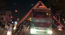 Pedestrian bridge collapses after heavy truck knocks it over