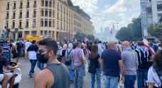 Police fire tear gas as thousands protest in Beirut