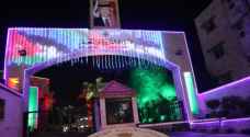 IMAGES: In light of 'Amman Day', Education Ministry decorates building with lights, flags