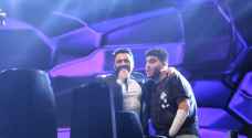 IMAGES: Tamer Hosny invites Saleh onto stage, crowd stands in respect