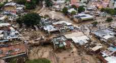 Neighbors, rescuers search for missing after Venezuela landslide