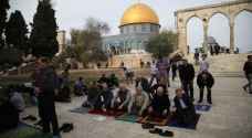 Tens of thousands perform Friday prayer at ....