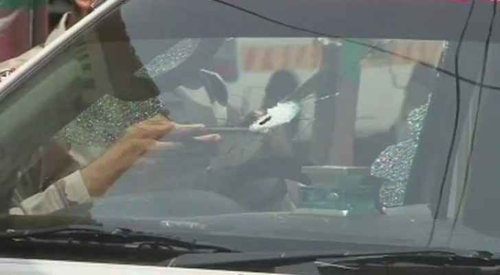 The SP was in his vehicle when it was shot at.  (Photo courtesy of Geo News)
