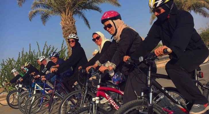 Women cyclists ride around the Corniche wearing long pants and loose shirts with helmets carefully placed over their headscarves. (Supplied)