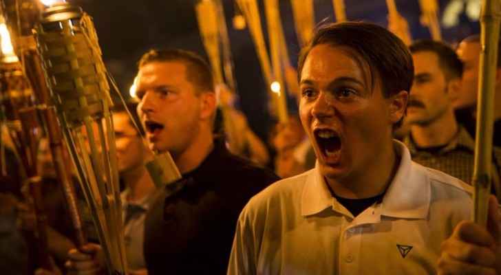 Far-right groups including KKK members chanting anti-Jewish slogans in Charlottesville. (Photo Credit: LogoTV)