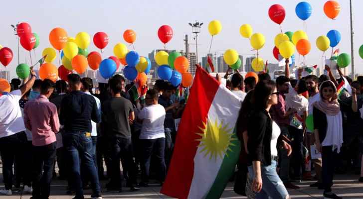 Kurdish people protesting outside of Erbil airport. (Photo Courtesy: Reuters)