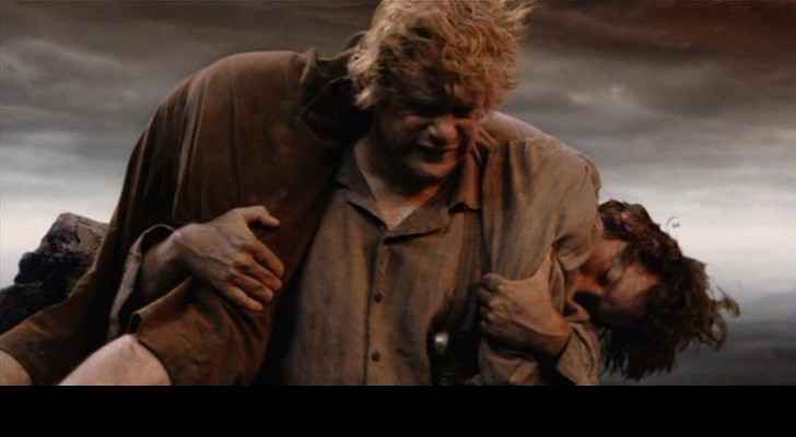 A scene from The Lord of the Rings where Sam is seen carrying Frodo. (Chapman.edu)