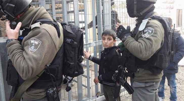 Israeli forces arresting 9-year-old Muhammad Daana. (Twitter) 