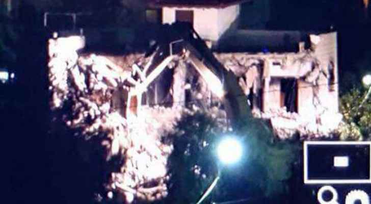 The Israeli bulldozers demolishing Naser's family home and three others. (Twitter)