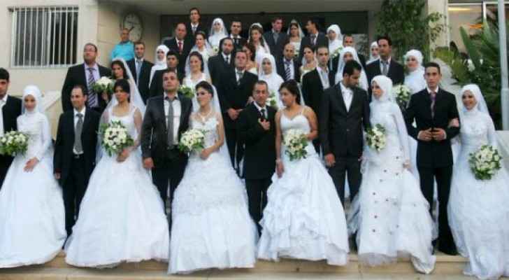 One of the mass weddings that took place in Jordan over the years. (Barlamane)