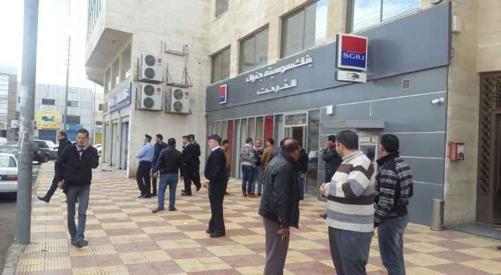 An image from outside the Societe Generale Bank Jordan in Al Wehdat area after the incident. (Roya)