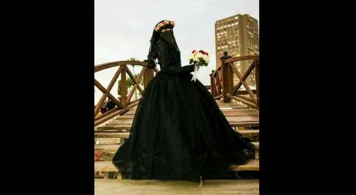Aya considers it part of her personal freedom to wear black on her engagement day. (Muthaqaf) 