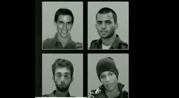 A photo for the four Israelis abducted in Gaza