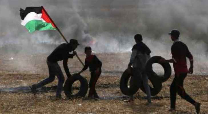 Palestinians burning tyres during the "Tyre Burning Friday" 