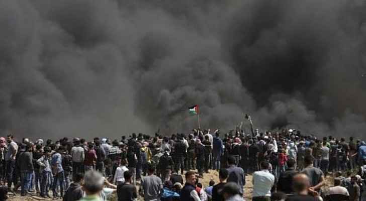 Palestinian demonstrators near the Gaza borders