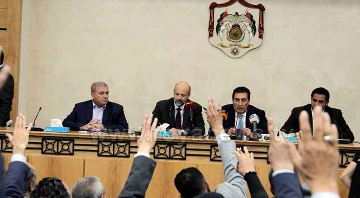 PM Omar Razzaz (center left) during the meeting with MPs. (Roya)