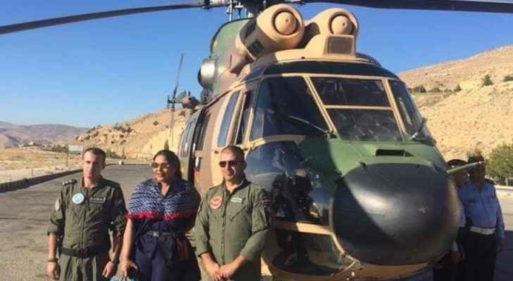 Ahlam posing next to the military helicopter. (Alkhaleejonline.net)