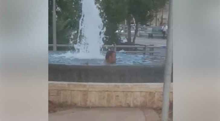 It is unknown why the man was swimming in the fountain. (Facebook)