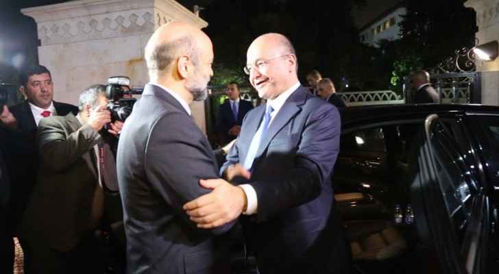 Iraqi President and Jordanian PM Omar Razzaz 