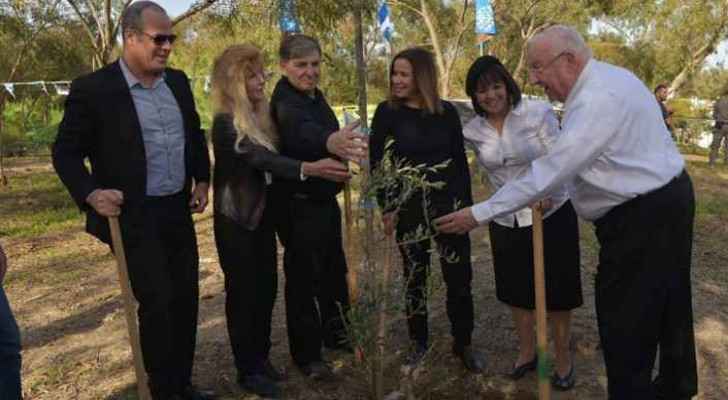 Israelis and Jordanian Embassy staff plant trees in Baqoura in memoriam of killed Israeli girls