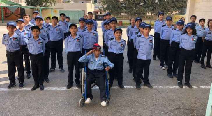 Young boy with physical disability achieves dream in being security officer